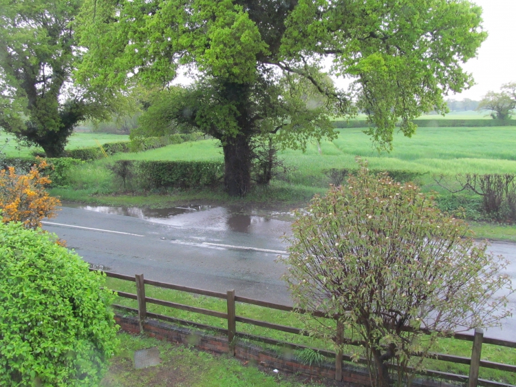 Recurrent flooding opposite Kiln Cottage due to partially blocked drain